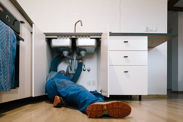 Professional Drain Cleaning technician working in Grant, FL
